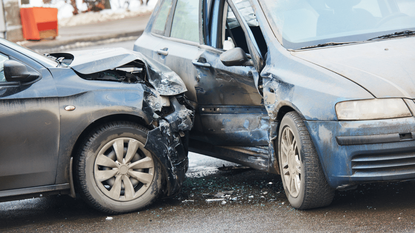  A Malaysian car involved in a traffic accident, showing visible damage to the front bumper