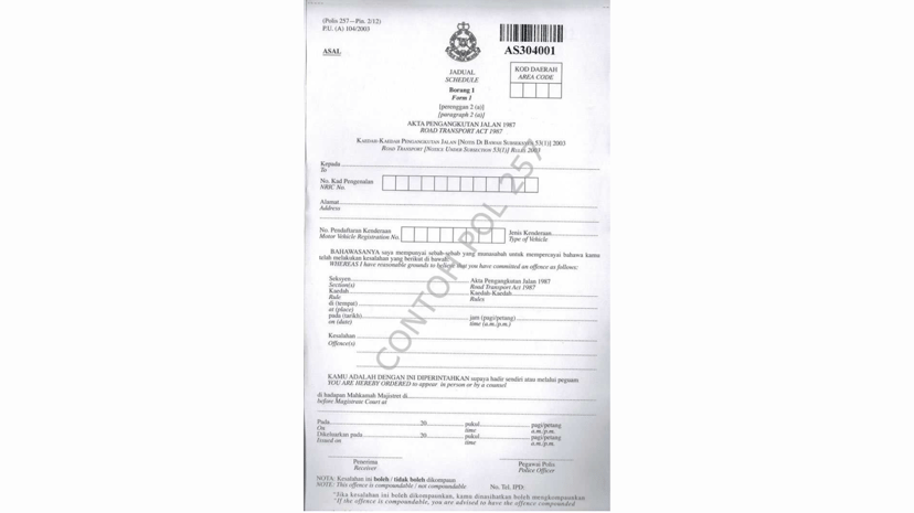 Image of a POL. 257 traffic summons issued by PDRM, detailing on-the-spot traffic violations."