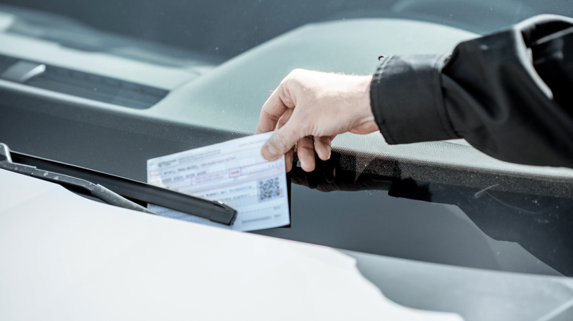 "Image of a traffic summons issued via post, emphasizing non-compliance with parking regulations