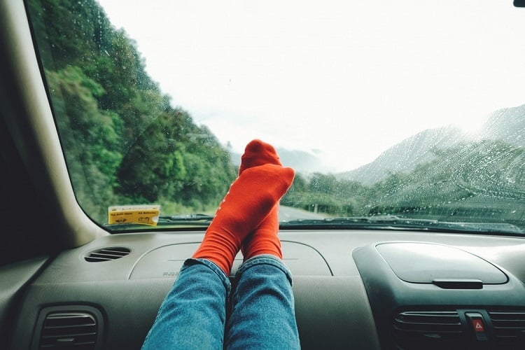 Motorist Feet On Dashboard